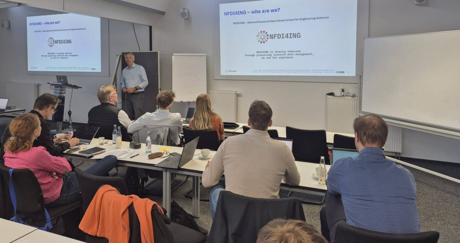 Prof. Robert Schmitt introducing the consortium NFDI4ING to the audience at the MHI autumn meet 2026